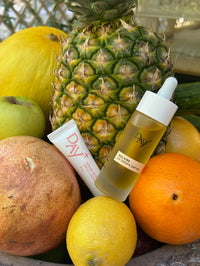 Duo SPF au milieu des fruits.