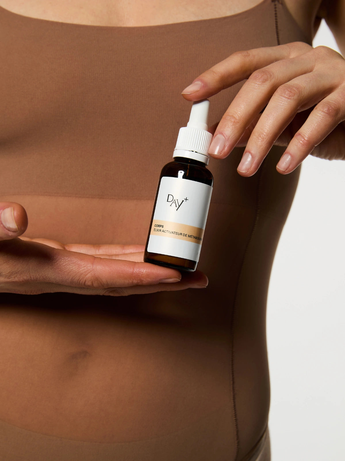 Flacon d'Élixir Activateur de Métabolisme de chez Day+.