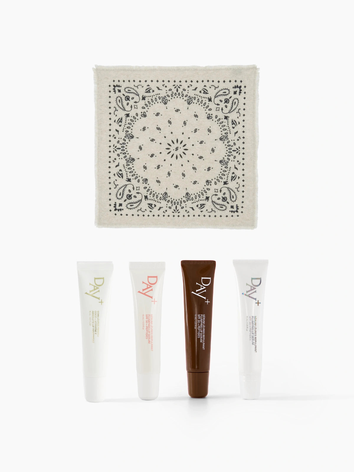 Collaboration de Noël Kujten x Day+ composé du bandana Hachi et de l'un de nos soins lèvres au choix.