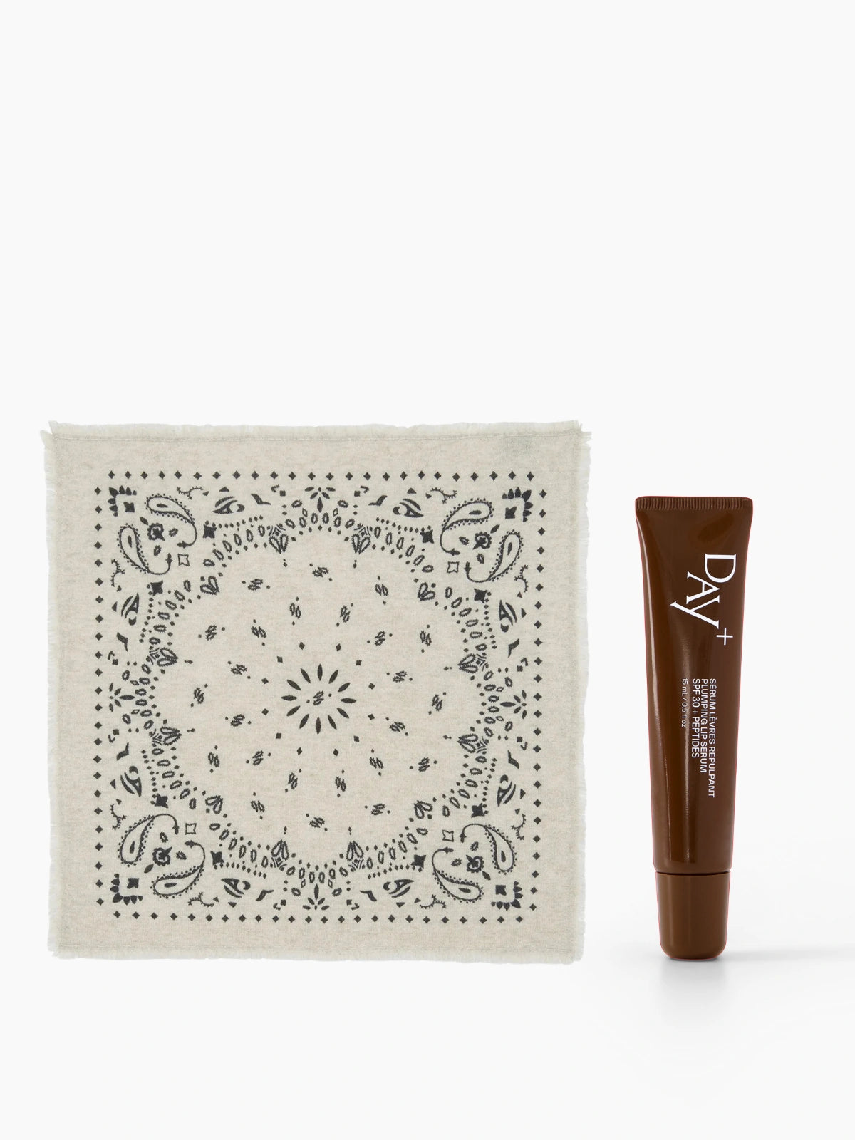 Collaboration de Noël Kujten x Day+ composé du bandana Hachi en couleur Avoine avec le Sérum Lèvres en teinte 02. Light Brown.