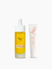 Duo SPF : flacon des UV Drops SPF 50 et tube du Sérum Lèvres Repulpant SPF 30 - Couleur 01.Clear gloss.