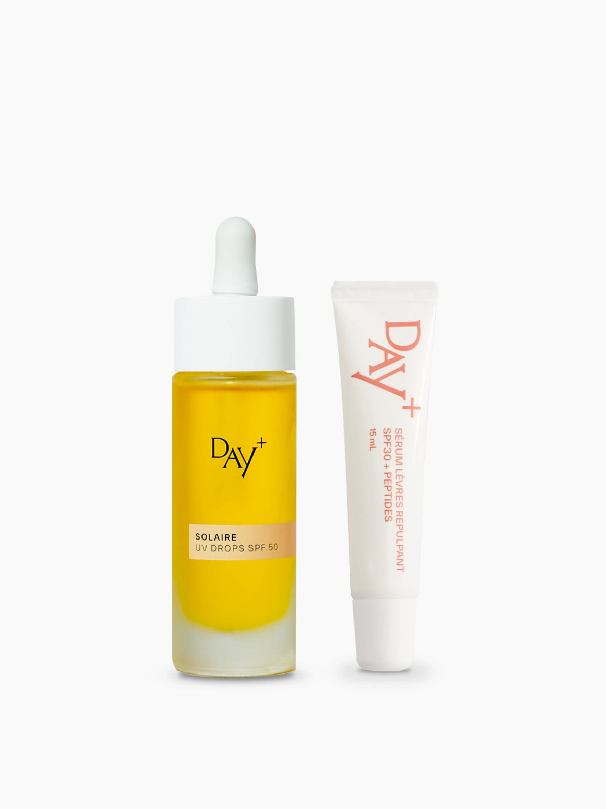 Duo SPF : flacon des UV Drops SPF 50 et tube du Sérum Lèvres Repulpant SPF 30 - Couleur 01.Clear gloss.