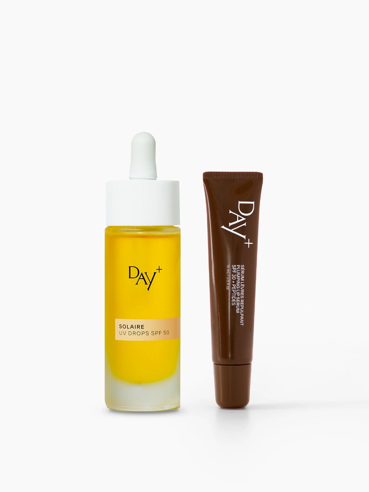 Duo SPF : flacon des UV Drops SPF 50 et tube du Sérum Lèvres Repulpant SPF 30 - Couleur 02.Light Brown.
