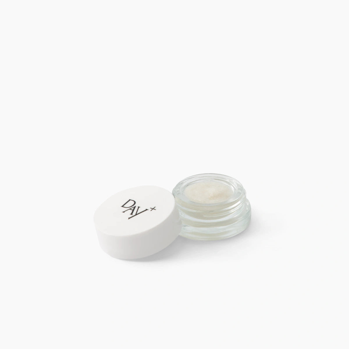 Pot de Eyes & Cheeks Gloss ouvert avec son bouchon.
