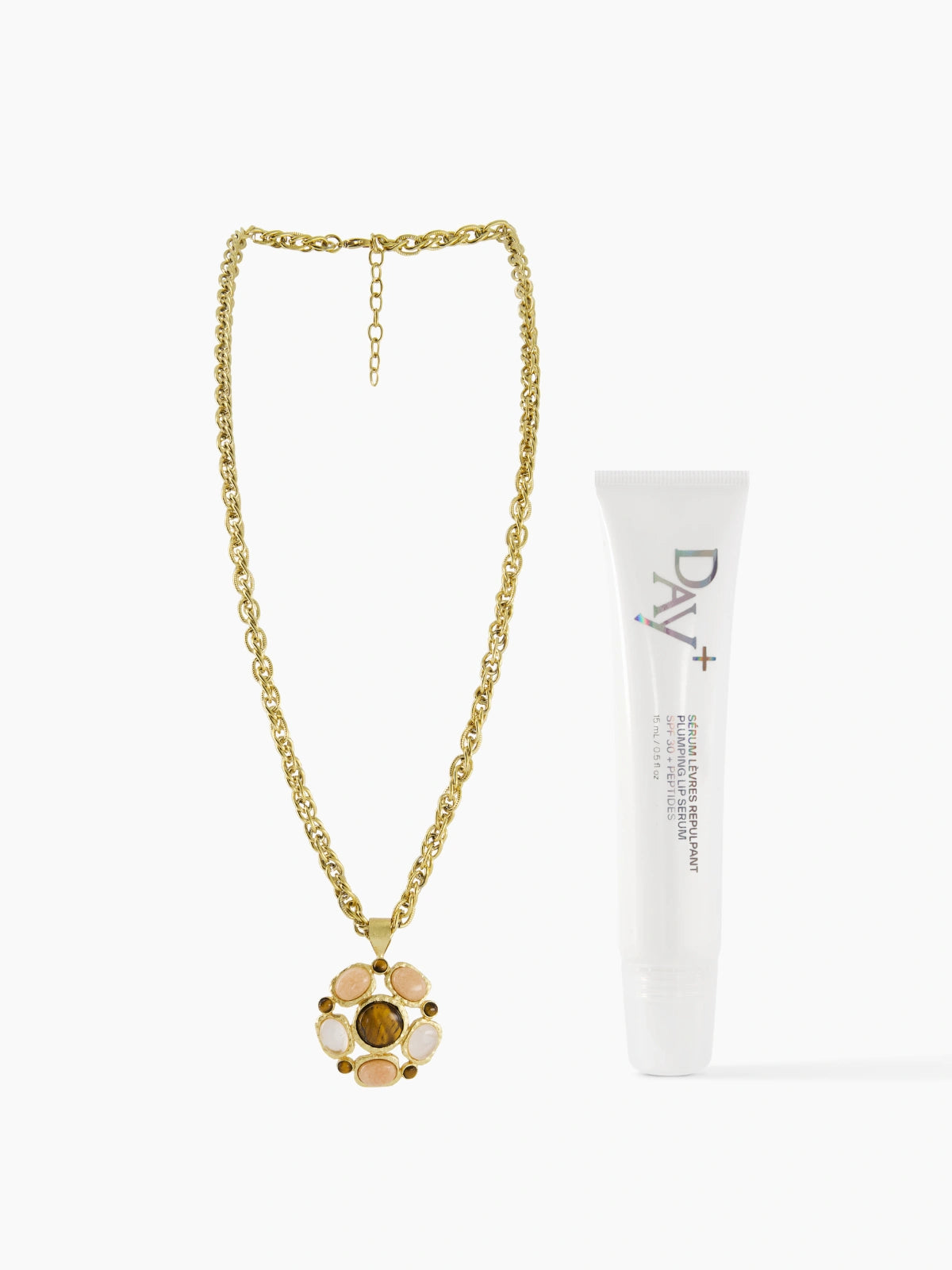 Collaboration de Noël Dear Charlotte x Day+ composé d'un sautoir multi-pierres et du Sérum Lèvres Irisé.